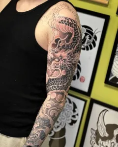 blak and grey dragon tattoo