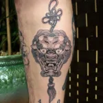 foo dog leg tattoo
