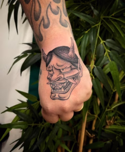 walk in black mask tattoo
